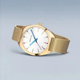 Bering Classic | polished gold | Mesh B/W with Rainbow Strap