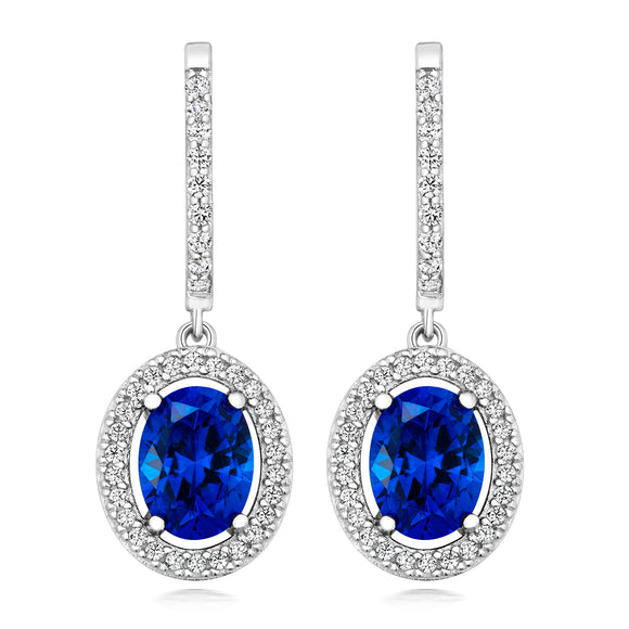 LAPIDARY HALO STYLE DROP EARRINGS. BLUE 8x6MM OVAL CUT